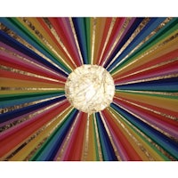 an image of a rainbow sun with a sunburst in the middle